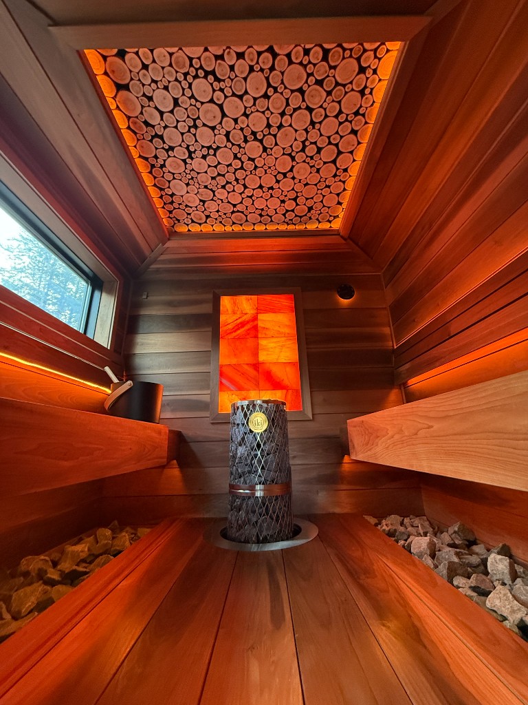 Wood-cookie ceiling with amber lighting